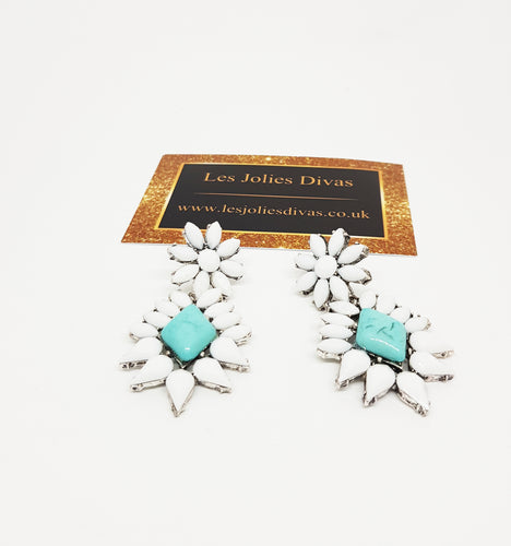 flower shaped statement earrings